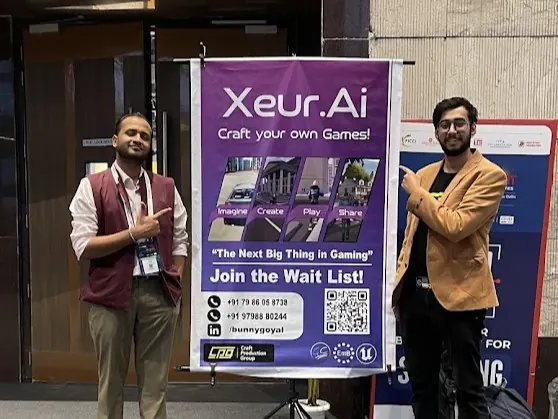 Bunny Goyal beside the Xeur AI stand — Craft your own Games — at a games conference